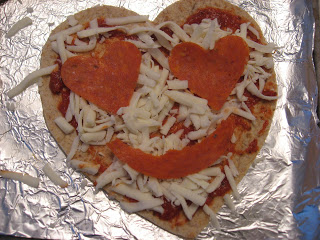 toddler made heart shaped pizza